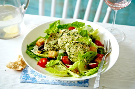 Dress up a traditional chicken Caesar salad with a flavoursome herby pesto and olive twist