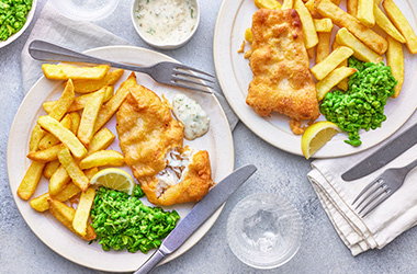 Beer-battered fish with mushy peas