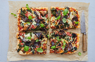 Cheat's mushroom pizza traybake