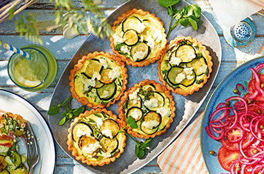 Watercress, courgette and ham quiches