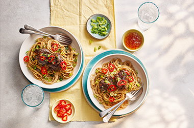 Crispy chicken livers with spring onion noodles