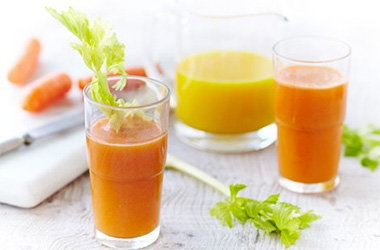 Fresh orange, carrot and celery juice