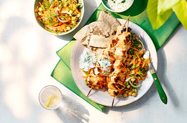 Spiced chicken skewers with chickpea salad