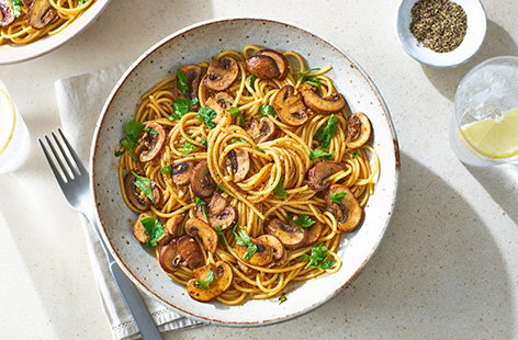 Whip up a delicious pasta dish using ingredients from your storecupboard. Stir your spaghetti and mushrooms into a silky sauce made from soy sauce, butter and garlic.