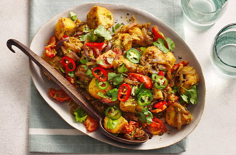 Breathe new life into leftover roasties with this spicy potato side dish. You can use whatever spices you have in – ground cumin, coriander, paprika, fennel seeds or curry powder will work.