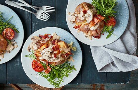 Get inspired by the flavours of a classic breakfast with these Full English loaded baked potatoes. Top crispy jacket potatoes with creamy mushrooms and crispy bacon, then serve with juicy grilled tomatoes and peppery rocket.