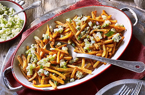 Great for sharing, these Buffalo fries are a fun new way to add some excitement to frozen French fries.