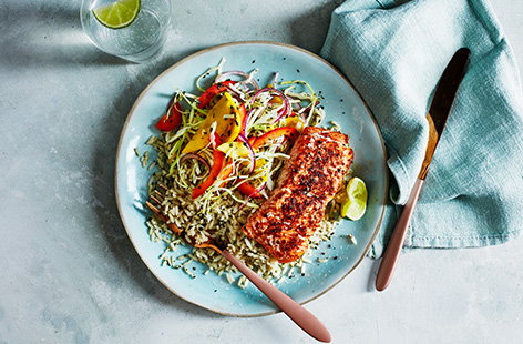 A spicy Cajun-spiced salmon fillet is the main protein in this simple dish