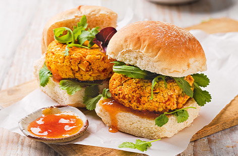 Make your own vegan burgers using tinned butter beans and baby carrots. Try cooking these in your air-fryer to get them extra crispy.