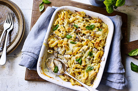 This hearty chicken pasta bake recipe is a simple way to feed the whole family. With tender chicken and garlicky fried mushrooms, cream cheese makes an easy cheat's sauce, for dinner ready in 45 minutes.