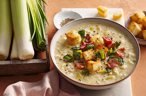 Mature Cheddar and Stilton adds a comforting creaminess to this indulgent cheesy leek soup recipe