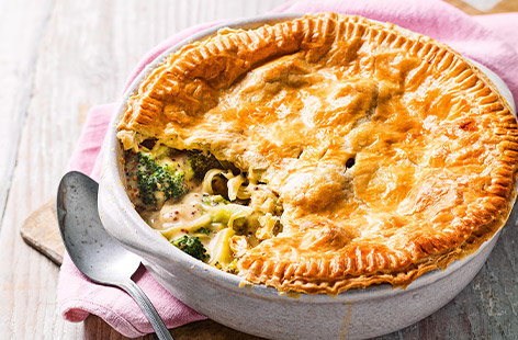 A family favourite made easy, this pot pie is made using tinned creamy chicken soup and ready-rolled puff pastry. Serve with mashed potato, if you like.