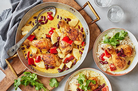 Make this colourful, tropical inspired chicken curry recipe for an easy curry night. Chicken drumsticks (a great budget-friendly option) are cooked in a rich coconut sauce with juicy pineapple, kidney beans and red pepper.