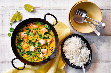 Ready in just 30 minutes, this flavourful fish curry recipe is an easy leftover salmon idea. The flaky fish joins spinach in a creamy coconut sauce spiced with curry powder, turmeric and chilli. Serve with basmati rice, a scattering of coriander and lime wedges to squeeze over.