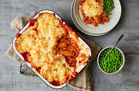 Make Friday a pie day! This hearty American-inspired cowboy pie is a new family favourite the kids will love. Take tins of baked beans and combine with sausages and smoky BBQ sauce, then top with cheesy mash and bake until bubbling for winter comfort food.