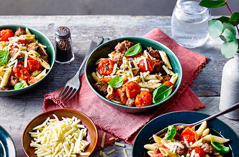 This crispy sausage and tomato pasta is a quick and easy dish that takes less than 20 minutes to make. Combining flavoursome pork sausages with a fresh tomato sauce, it's sure to be a family favourite.