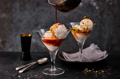 Channel the flavours of a classic espresso martini cocktail into a simple Italian-inspired Valentine's Day dessert for two. This elegant espresso martini affogato combines smooth vanilla ice cream with a drizzle of espresso martini liqueur and hot coffee.