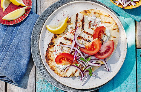 There's not much tastier than grilled halloumi, wrapped up Greek-style with fresh tzatziki and veggies