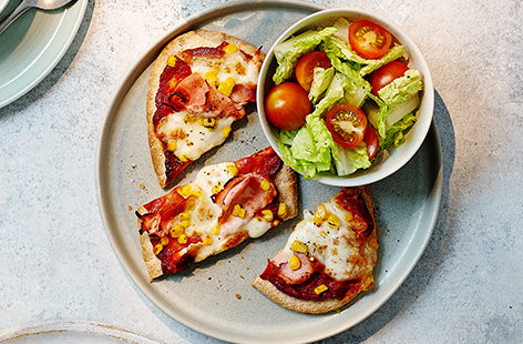 Lunchtimes are easy with this speedy pizza recipe, made using pitta breads. 