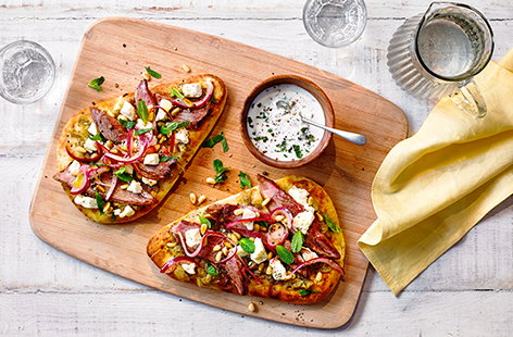 Put leftover Easter lamb to use in this simple lamb flatbread recipe. Pile up smoky grilled aubergines, feta, pine nuts and the lamb on a store-bought naan and bake until lightly crispy. Drizzle with garlic yogurt to finish.