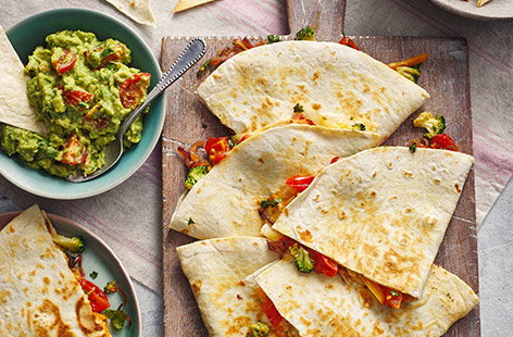 Quick to make and bursting with vibrant veg, these cheesy quesadillas will be loved by kids and adults alike