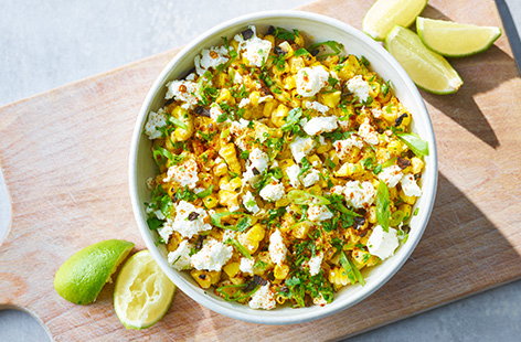 Jazz up your sides game with this flavour-packed corn salsa. Charred corn is tossed together with a creamy dressing, coriander, spring onion and lime juice. It's a fab accompaniment to a juicy burger!