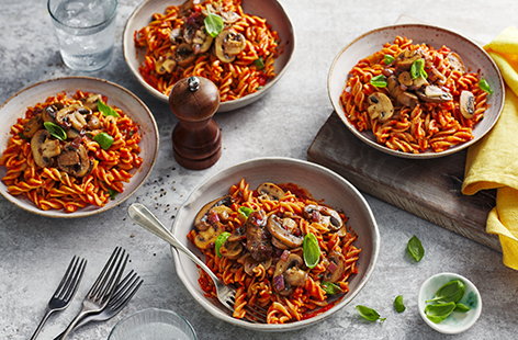 Give this tangy balsamic mushroom pasta with tomato sauce and basil a go for your next meat-free meal.