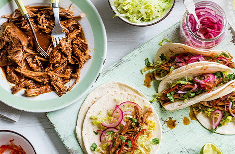 For the ultimate family feast, this slow-cooker pulled pork recipe is fantastic. Made with spicy Mexican chipotle chilli and a hint of orange, the meat is cooked until falling off the bone, then served with tortillas and macerated onions