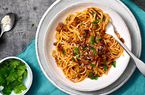 Spag bol, but faster and just as tasty! Why not try this healthy pasta dish, which uses leftover meatloaf and pasta sauce from our Lentil and beef meatloaf recipe. It's on the table in 15, so it's a real winning dinner for busy days.