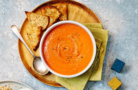 Pack your child's lunch full of vegetables in this easy-to-make sweet potato soup recipe with onion, carrot, celery and tinned tomatoes.