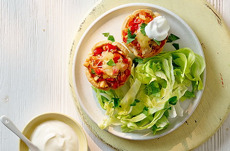 Making lunch for the kids just got easy with these turkey taco cups! Golden pastry is filled with turkey, peppers and tomatoes