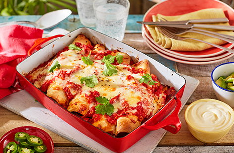 Try our new take on enchiladas with this recipe using Fire Pit chorizo sausages wrapped in tortillas and topped with a homemade tomato sauce and cheese.