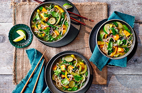 Curl up with a bowl of this comforting Thai veggie noodle soup recipe in just 30 minutes. This healthy soup is packed with veg - courgettes, sweet potatoes, spinach and peppers are cooked in a fragrant broth for an easy vegetarian dinner idea.