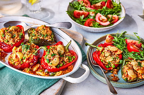 Stuff our cheat's paella into peppers for the perfect summertime dinner.