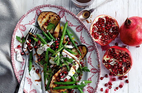 This beautiful summer vegetable salad is made with crunchy green beans and delicious chargrilled aubergines. Tangy feta and juicy pomegranate seeds should be sprinkled over the top just before this side dish or starter for two is served.