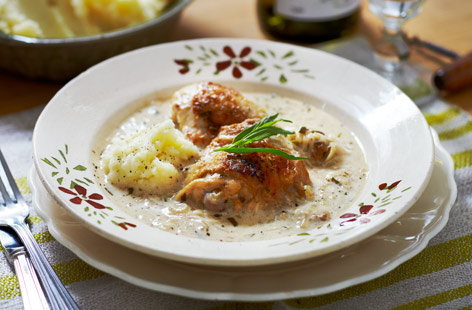 This slow-cooked chicken with shallots and tarragon makes a creamy comforting stew for supper. Chicken thighs and drumsticks gently simmer in wine and stock until the meat comes off the bone. Perfect with mashed potato.