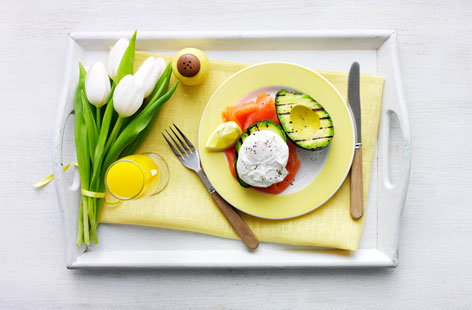 Luxury lovers breakfast in bed: A griddled avocado, poached egg and smoked salmon dish makes for a feast fit for a princess and is the ideal breakfast to treat your mum to on Mother's Day