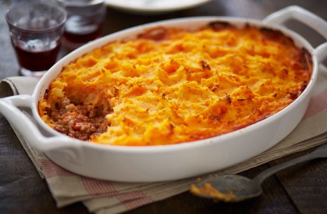 Rustle up this vibrant, hearty cottage pie with a twist. This version includes a gorgeous topping of sweet potatoes, carrots and parsnips