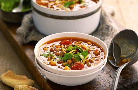 Filling, tasty and quick to make, this spicy soup is packed full of fresh herbs and storecupboard spices that make the most of its Moroccan flavours. Chickpeas and lentils add some extra bite. Serve with toasted pitta bread.