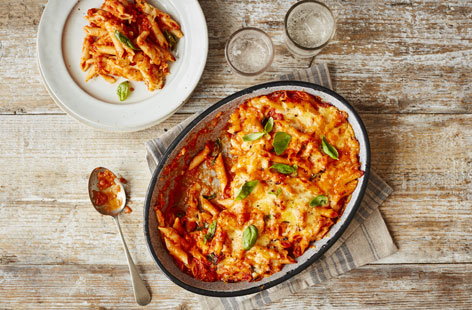 This creamy and tomatoey bake with gooey cheese is a delicious midweek dinner.