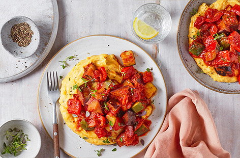 Tuck into a bowl of comforting creamy polenta topped with a delicious ratatouille. It's packed with fresh herbs and vegetables, a great winter warmer.