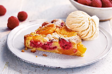 This gorgeous French dessert is traditionally made with cherries, but gets a seasonal twist with sweet apricots and raspberries in our clafoutis recipe