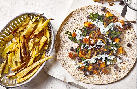 For a great vegan lunch idea, try this black bean and sweet potato wrap recipe. Making the most of hearty root veg, these tasty tortillas are stuffed with Mexican black beans, tender spinach and earthy sweet potato chunks.