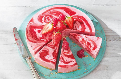 This vibrantly pink berry no-bake cheesecake makes a show-stopping summer dessert, yet is incredibly easy to make as there’s no tricky baking involved – just a little bit of stirring on the hob and blitzing in a food processor.