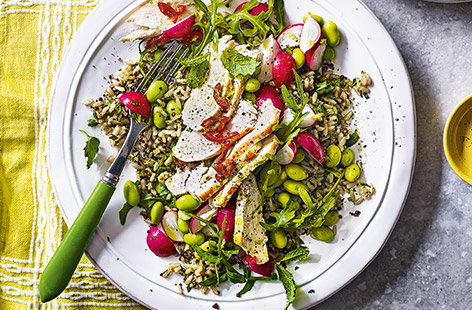 Pack up this colourful salad and take to work for a healthy packed-lunch. Marinated chicken with a touch of chilli heat and nutty quinoa combine for an easy meal that will keep you going all afternoon. 