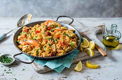 Paella is said to have originated in Valencia, on Spain’s eastern coastline, where it’s traditionally made with meat and cooked on an open fire.