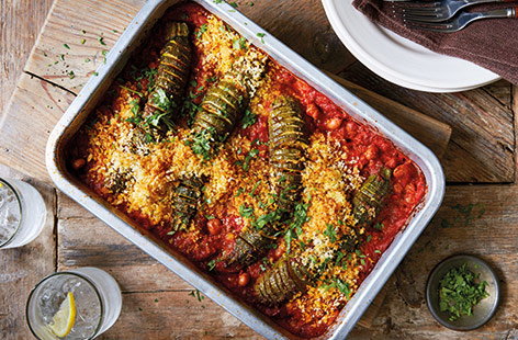 The simple technique of making hasselback courgettes is an easy way to add maximum flavour to your veg. In this one-tray hasselback courgette bake, the courgettes are rubbed with harissa and roasted on a smoky tomato sauce, before being topped with crunchy