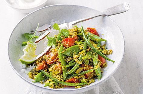 Green and runner beans provide colourful crunch to a fragrant, spiced tomato base for a quick and simple vegan meal.