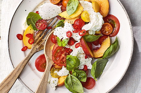 This colourful peach and mozzarella salad is perfect for making when sweet peaches and tomatoes are at their seasonal best, for a fresh summer flavour combination of creamy mozzarella and juicy ripe fruit that really works.