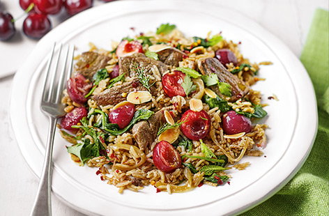 Try something different with fresh British cherries during their short summer season. This Moroccan-inspired spiced pilaf is a clever one-pot recipe, filled with juicy cherries, tender lamb and spinach for a simple family dinner.